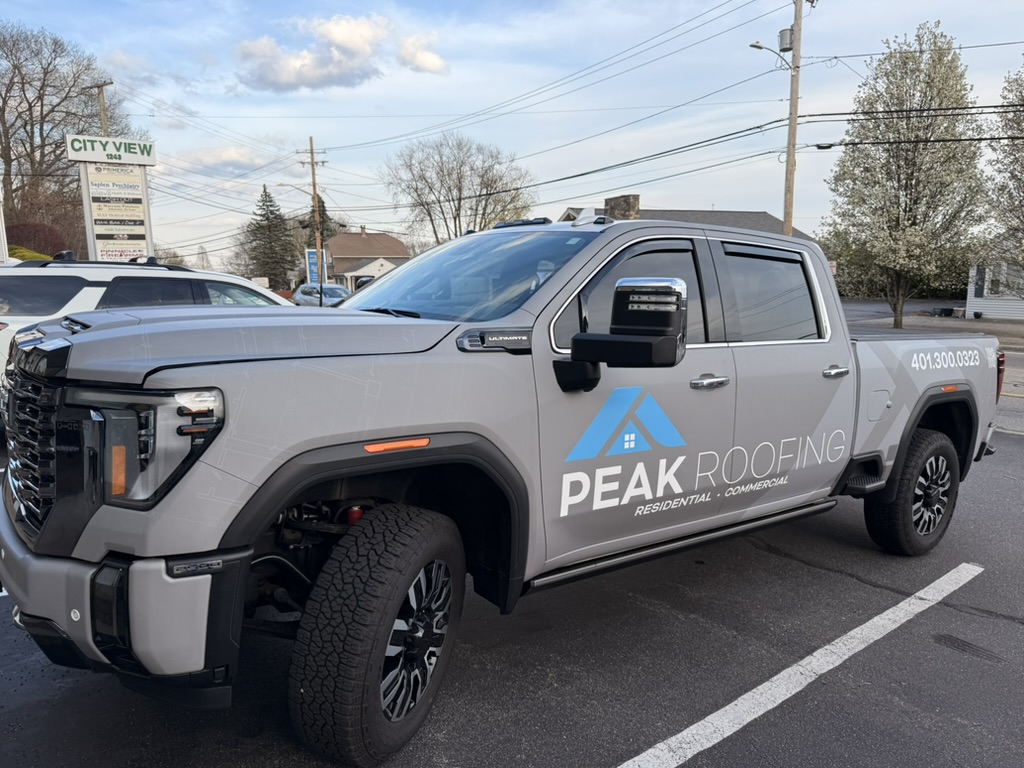 Peak Exteriors branded truck on location